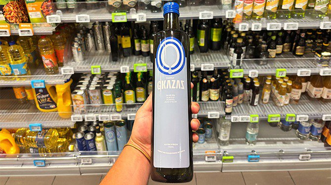 Bram gaat in de supermarkt altijd voor de olijfolie met de meeste bijvoeglijke naamwoorden cover