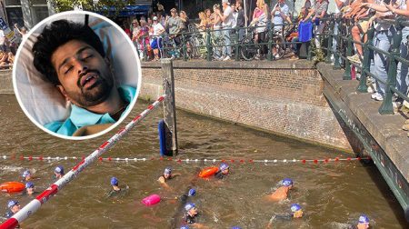 Dronken toerist die in gracht lazerde krijgt medaille voor City Swim
